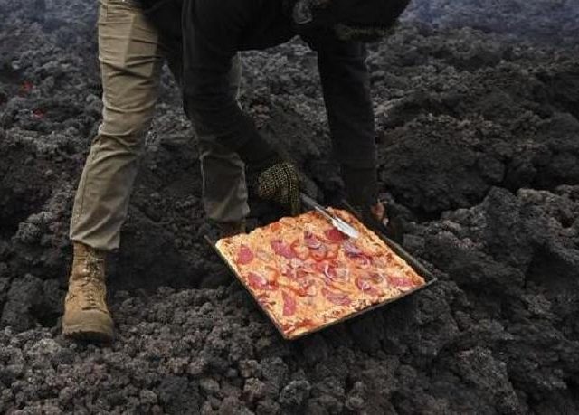 The Pizza Is Cooked Directly On The Heat Of The Volcano